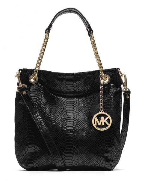 black michael kors purse side pocket|Michael Kors black patent tote.